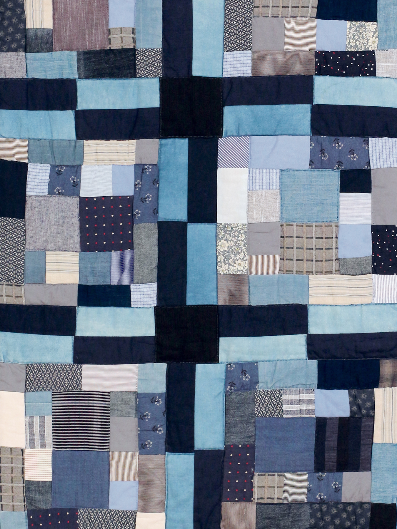 Close-up of blue patchwork wall hanging – Pénélope Westberg workshop